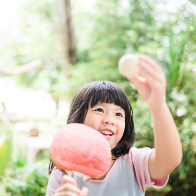 5 years old asian girl child  holding racket and serve at table tennis game outdoor concept.Concentrated little asian little girl playing and hitting table tennis ball.; Shutterstock ID 1478158361